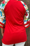 Red Top with white design bell sleeves and fringe trim
