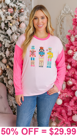 Nutcracker fuzzy patches neon pink long sleeve top