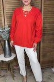 Red waffle knit with lace insets and criss cross neck