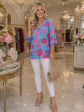 Blue top with pink floral print