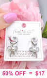 Silver huggie cuff earrings with bow pearl charm