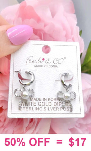 Silver huggie cuff earrings with bow pearl charm