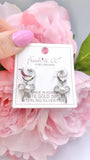 Silver huggie cuff earrings with bow pearl charm