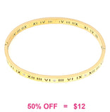 Gold bangle with Roman numerals and rhinestones