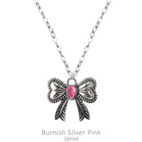 Silver Bow necklace with pink center stone