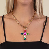 Gold Toggle Necklace with Bling Multi Color ornate cross pendant