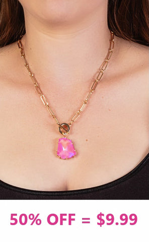 Gold necklace with pink gem stone