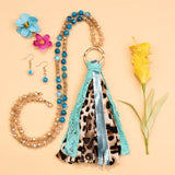 Crystal beaded necklace with gold ring and leopard tassel