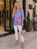 Blue top with pink floral print