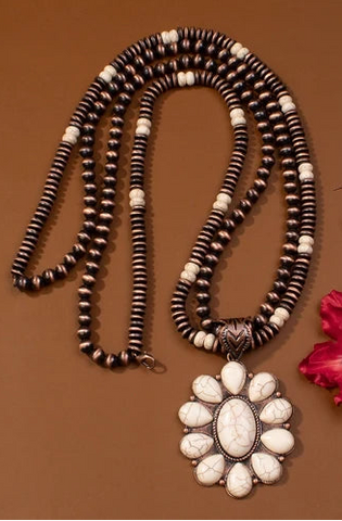 Copper necklace with cream pendant