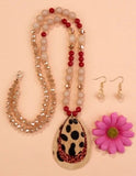 Crystal beaded necklace with leopard and red glitter teardrop pendant