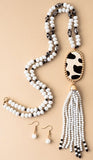 Crystal Necklace with Black White Cow Oval pendant & tassel