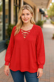 Red waffle knit with lace insets and criss cross neck