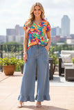 Orange tropical floral top