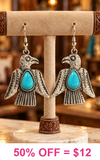 Silver Thunderbird earrings with turquoise stone