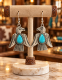 Silver Thunderbird earrings with turquoise stone