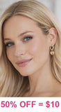 Gold Huggie earrings with heart charm