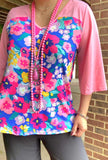 Blue Floral top with pink bell sleeves