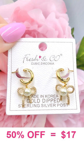Gold huggie cuff earrings with bow pearl charm