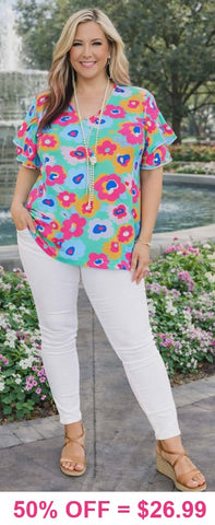 Turquoise Floral top with ruffle cap sleeves