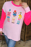Nutcracker fuzzy patches neon pink long sleeve top