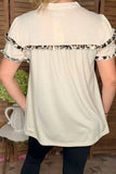 Cream top with leopard ruffle details