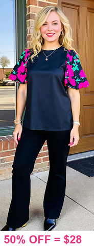 Black top with floral puff sleeves