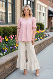 Pink printed blouse with puff sleeves