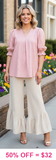 Pink printed blouse with puff sleeves