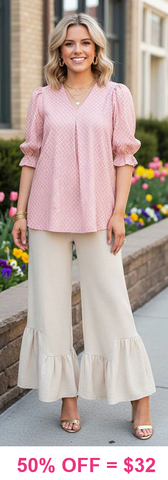 Pink printed blouse with puff sleeves