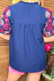 Navy blouse with pink floral embroidery sleeves
