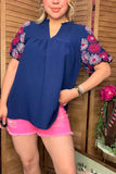 Navy blouse with pink floral embroidery sleeves