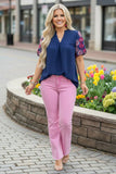 Navy blouse with pink floral embroidery sleeves