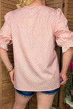 Pink printed blouse with puff sleeves