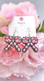 Pink stone bow earrings silver setting