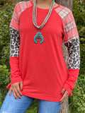 S, M, L, 3X Coral Top with plaid and leopard long sleeves.