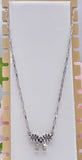 Burnished Silver Bow necklace