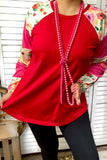 Red top with pink & floral striped long sleeves