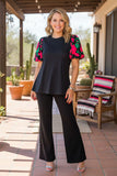 Black top with floral puff sleeves