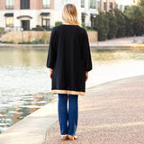 Black shimmery cardigan with gold trim