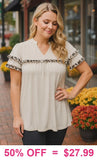 Cream top with leopard ruffle details