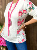 White top with pink floral sides