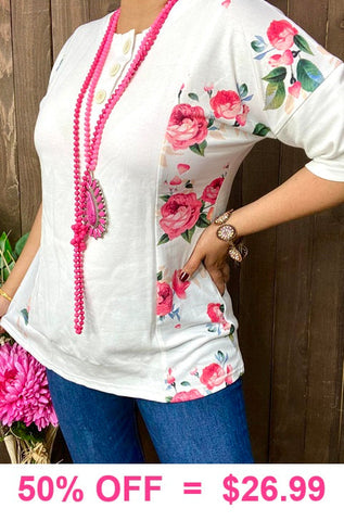 White top with pink floral sides