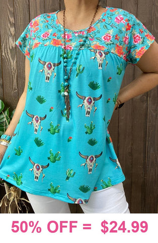 Turquoise steer print top with floral back
