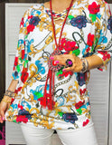 White Top with floral scroll print criss cross neck