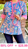 Blue flower top with pink trim sleeves