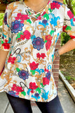 White Top with floral scroll print criss cross neck