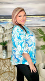 Blue swirl ruffle sleeve top