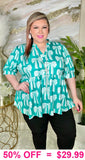 Turquoise Bow print top
