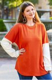 * Orange ribbed long sleeve top white sleeves